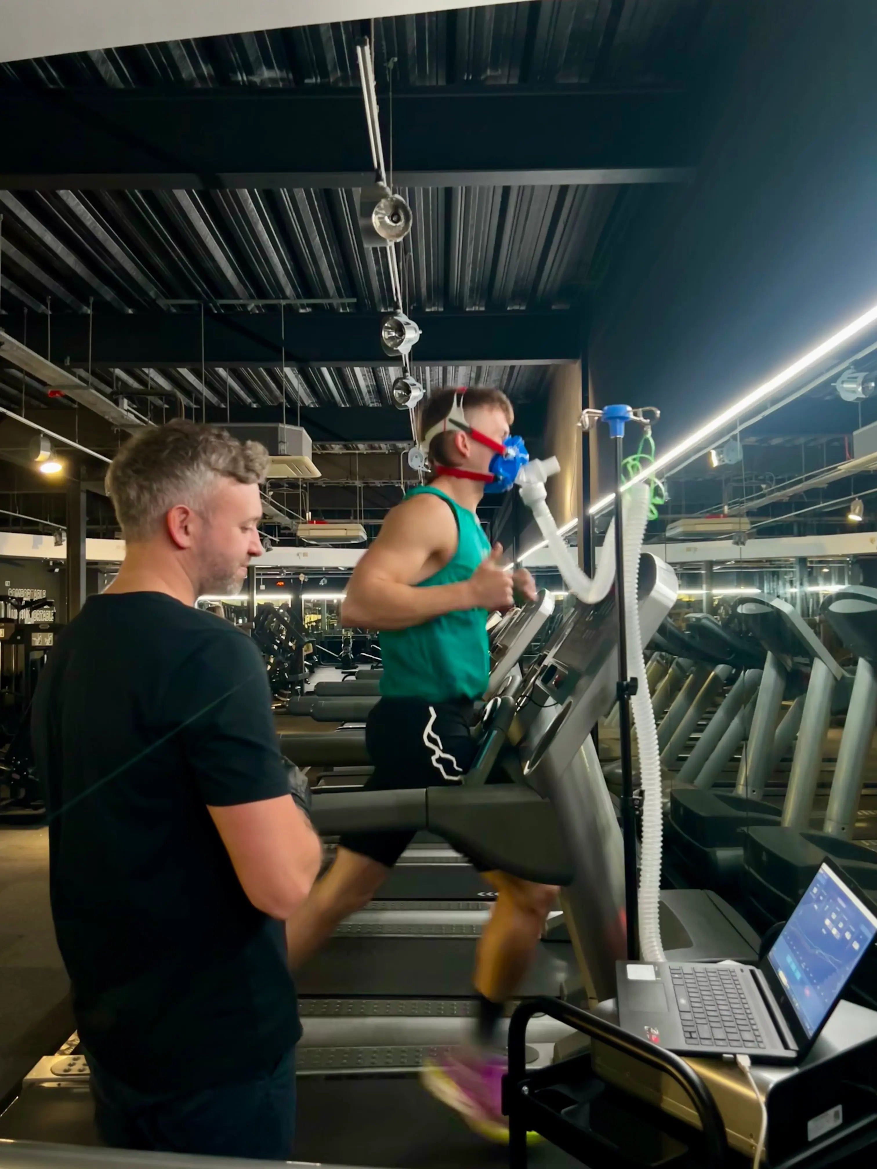 A person running on a treadmill during a Telomyx VO2 Max test